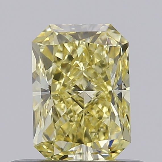 Actual 0.52 carat Fancy Intense Yellow Radiant lab-grown diamond