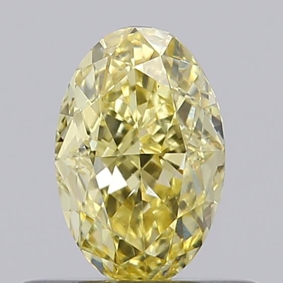 Actual 0.51 carat Fancy Yellow Oval lab-grown diamond