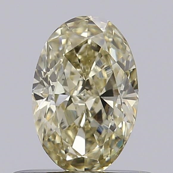 Actual 0.51 carat Fancy Yellow Oval lab-grown diamond