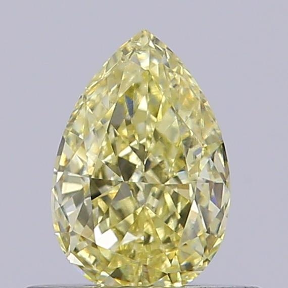 Actual 0.54 carat Fancy Yellow Pear lab-grown diamond