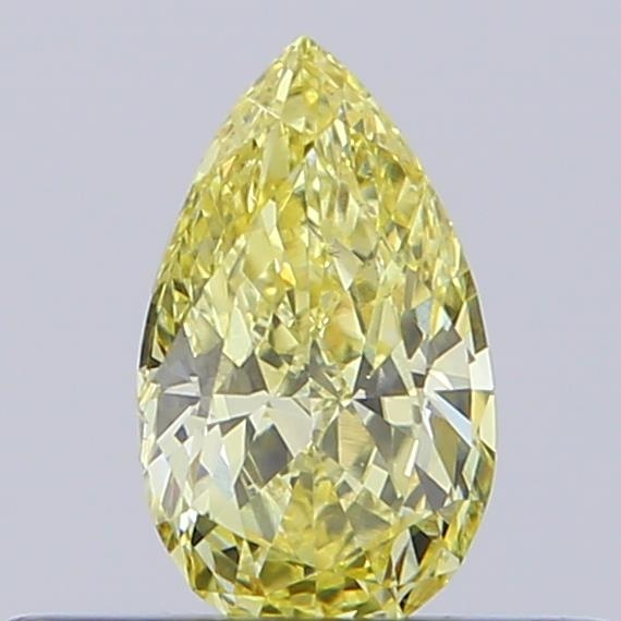 Actual 0.31 carat Fancy Yellow Pear lab-grown diamond